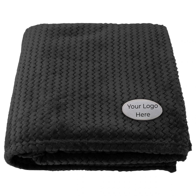 Snuggle Up soft-textured flannel blanket with a plush, cosy feel, perfect for staying warm and comfortable while relaxing.