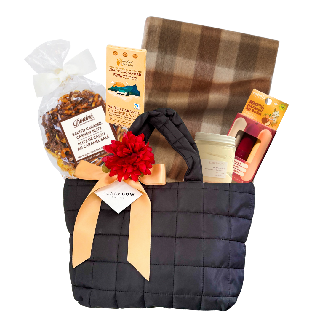 Autumn Glow zippered puff gift bag in black with tan satin ribbon and floral accent.