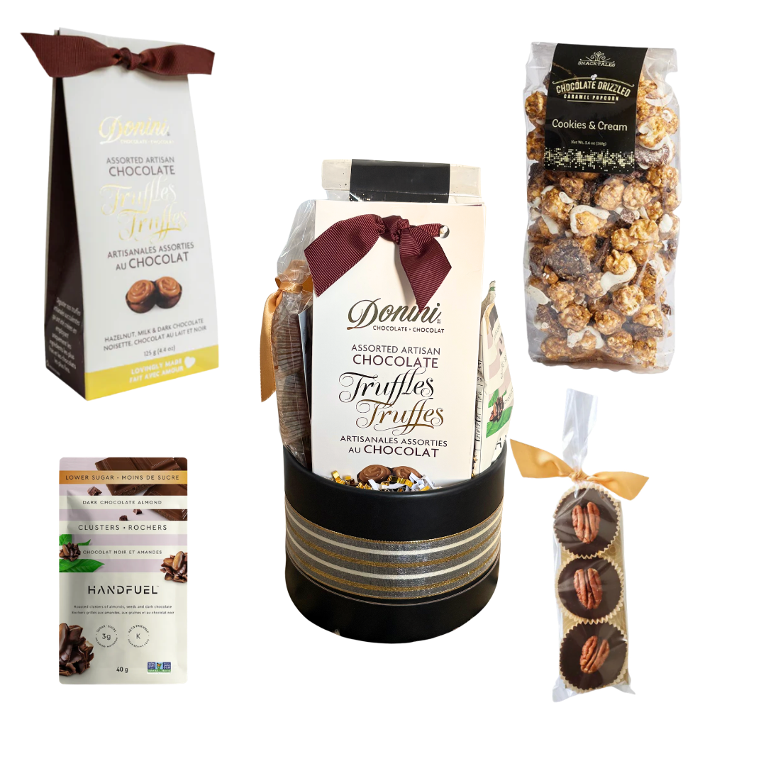 Gourmet chocolate gift basket featuring artisan chocolate truffles, handcrafted chocolate pecan clusters, cookies and cream popcorn, gourmet roasted nuts, and premium sweet treats, beautifully wrapped for gifting.