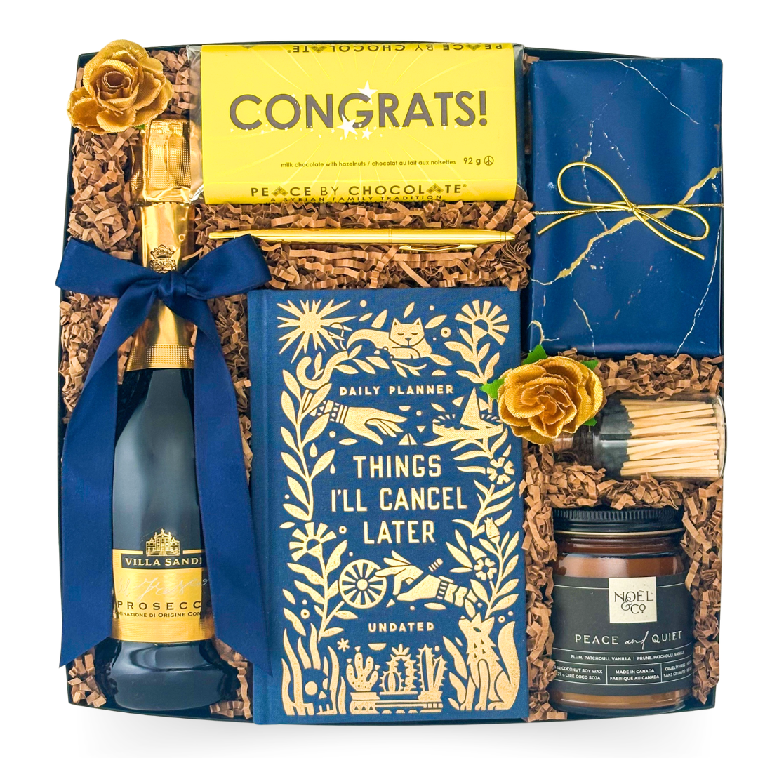 Well Earned milestone gift box with hardcover notebook, Peace & Quiet candle and gourmet treats by Black Bow Gift Co.
