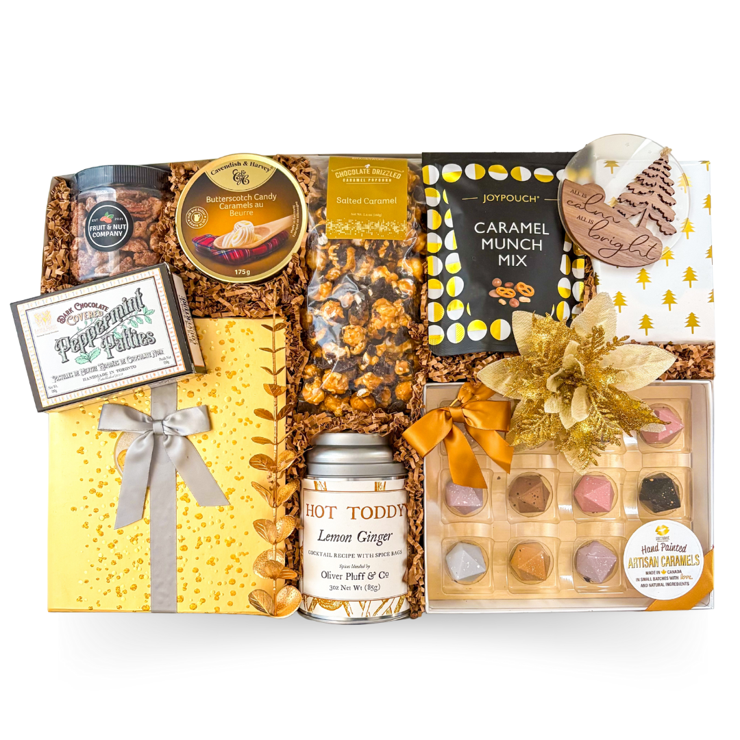 Luxury silver and gold holiday gift box with gourmet snacks and festive ornament by Black Bow Gift Co.