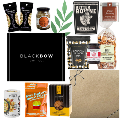 Dad’s Snack Stash Father’s Day gourmet gift box with jerky, pistachios, caramel snacks, smoky seasonings, cookies, dip mix, and dad-themed treats in a sleek black gift box.