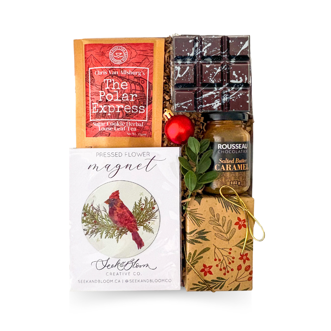 A Maritime Christmas Nova Scotia-made holiday gift box featuring artisan chocolates, salted caramel, festive tea, shortbread and a cardinal keepsake.