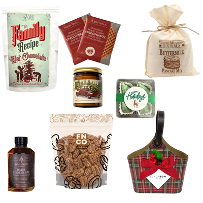 A Merry Morning Christmas breakfast gift in a red tartan leatherette keepsake basket with pancake mix, maple treats, hot chocolate, chocolates and optional candle.