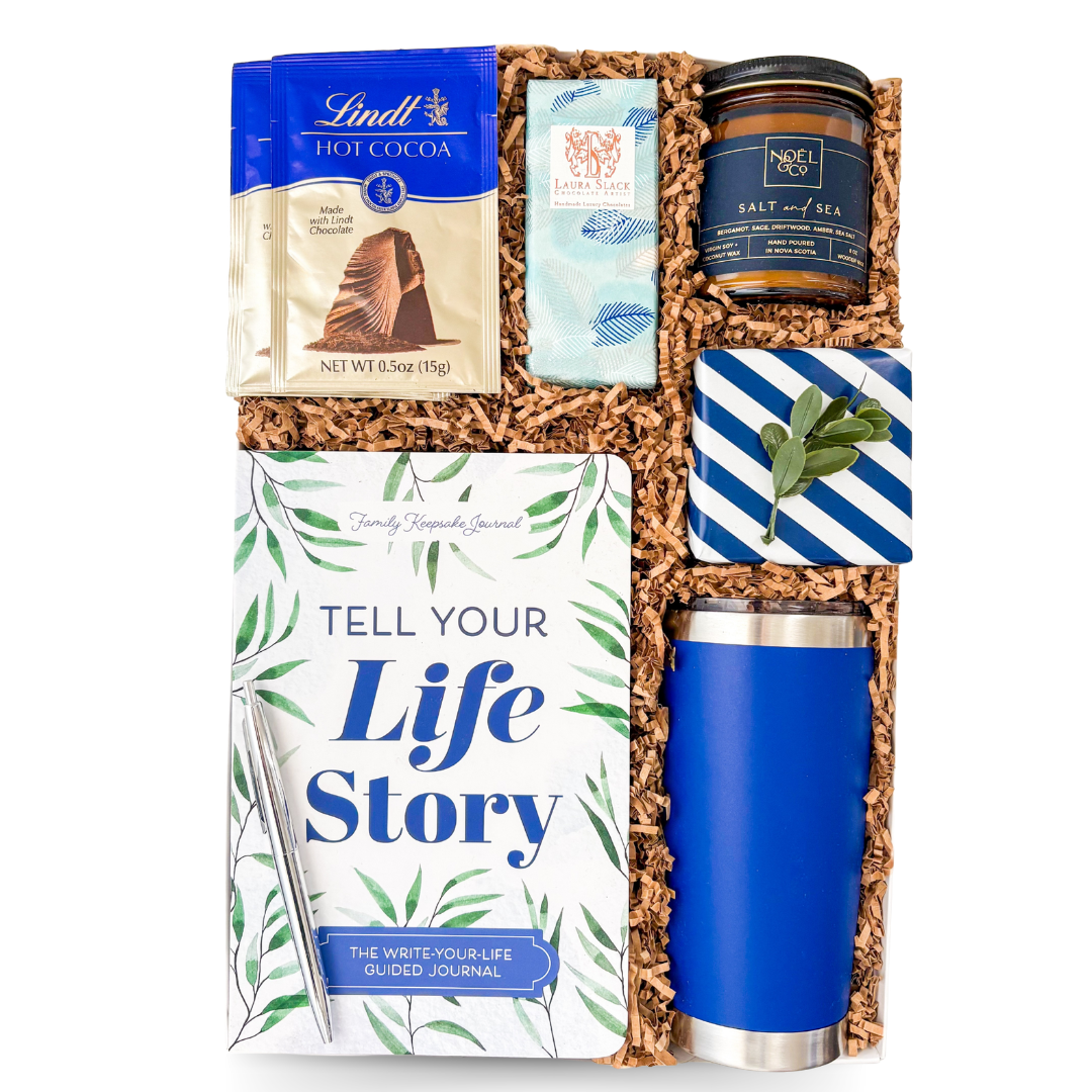 A Story to Tell gift box with life story journal, candle and cozy treats in a blue and white signature box by Black Bow Gift Co.