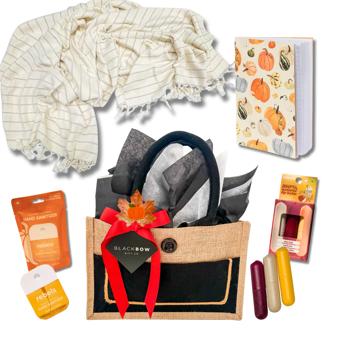 Autumn Comfort fall gift basket with cozy blanket, pumpkin spice self-care gifts and seasonal accessories
