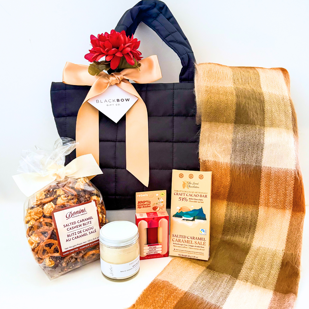 Autumn Glow zippered puff gift bag in black with tan satin ribbon and floral accent.