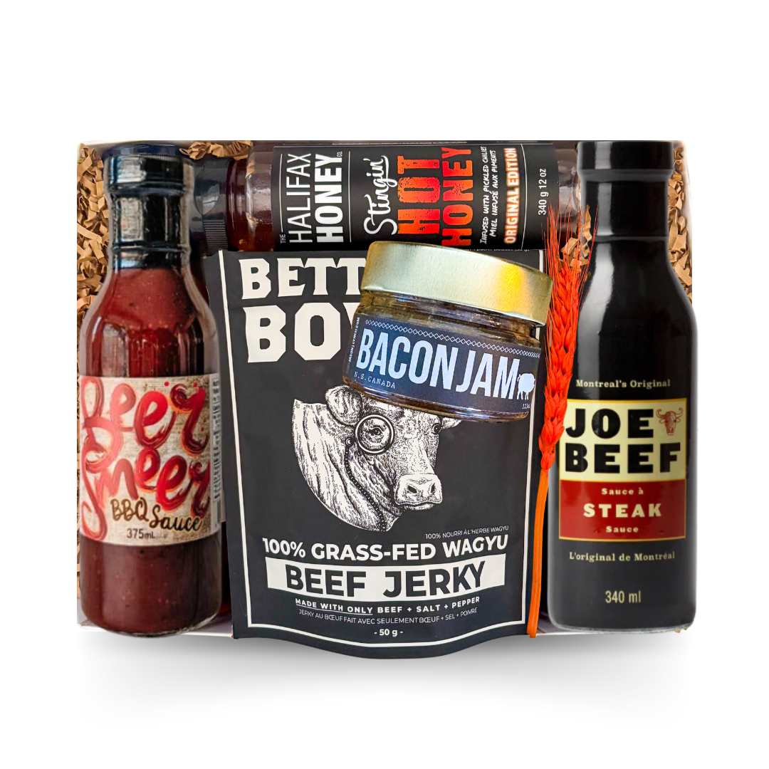 BBQ gift box featuring gourmet barbecue sauces, bacon jam, beef jerky, hot honey, and grilling favourites presented in a signature gift box by Black Bow Gift Co.

