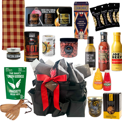 BBQ gift bag featuring gourmet grilling sauces, seasonings, snacks, serving accessories, and reusable organizer bag by Black Bow Gift Co.