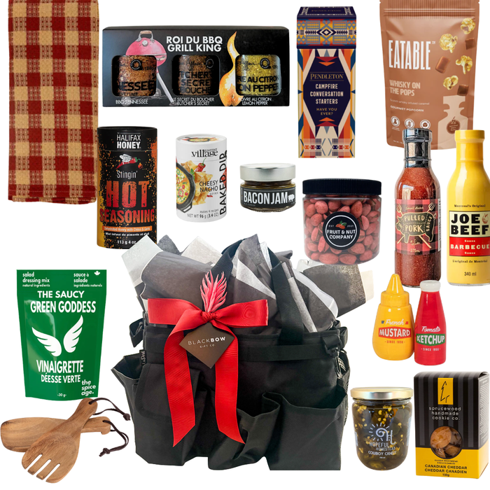 BBQ gift bag featuring gourmet grilling sauces, seasonings, snacks, serving accessories, and reusable organizer bag by Black Bow Gift Co.
