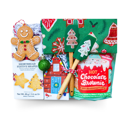 Kids Christmas gift box with baking accessories, cookies, and festive activities by Black Bow Gift Co.