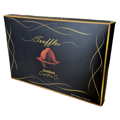 Six individually wrapped Bonbon Confections Original Dusted Cocoa Truffles featuring smooth, decadent chocolate centres coated in a delicate dusting of cocoa.