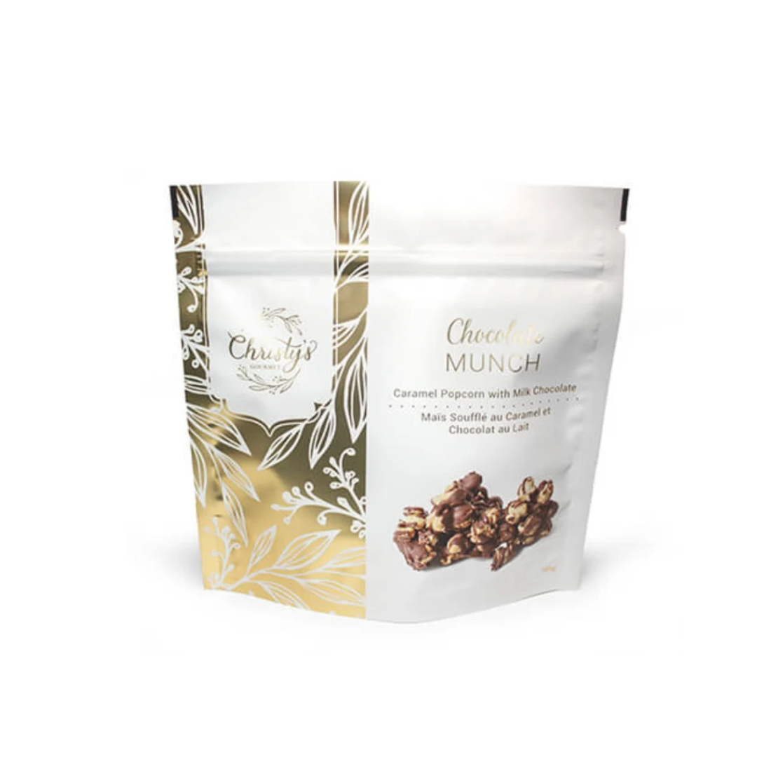 Caramel Popcorn Mix Drizzled in Milk Chocolate in White and Gold Packaging.