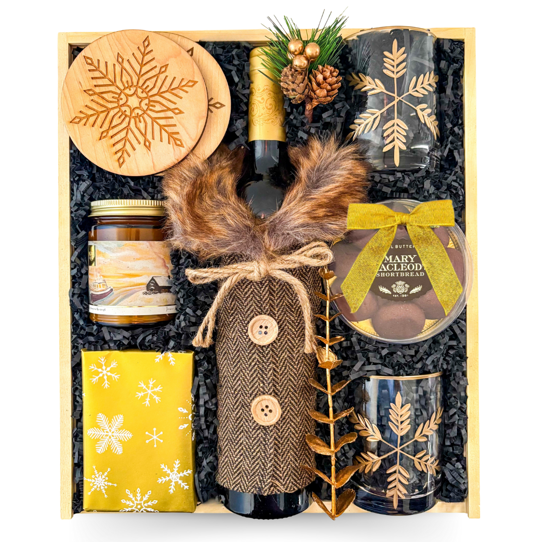 Luxury holiday wine gift box with Malbec, gold accents, and cozy coastal details by Black Bow Gift Co.