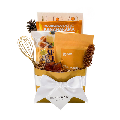 Basket-style breakfast gift with cozy morning accents and warm, homestyle touches.