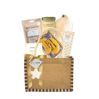 Cozy Nordic Retreat gift set featuring soothing self-care essentials and indulgent treats arranged in a rustic burlap tote, perfect for relaxation, comfort, and winter-inspired gifting.