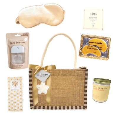 Cozy Nordic Retreat gift set featuring soothing self-care essentials and indulgent treats arranged in a rustic burlap tote, perfect for relaxation, comfort, and winter-inspired gifting.