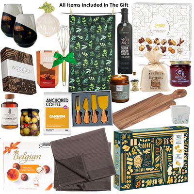 Luxury home gift basket in a large high-gloss black magnetic keepsake gift box featuring artisan coffee, premium olive oil, handcrafted serving board, cheese knife set, gourmet foods, breakfast essentials, and elegant home keepsakes.