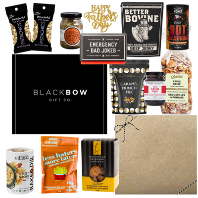 Dad’s Snack Stash Father’s Day gourmet gift box with jerky, pistachios, caramel snacks, smoky seasonings, cookies, dip mix, and dad-themed treats in a sleek black gift box.