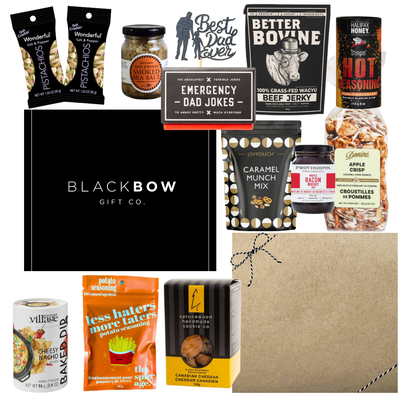 Dad’s Snack Stash Father’s Day gourmet gift box with jerky, pistachios, caramel snacks, smoky seasonings, cookies, dip mix, and dad-themed treats in a sleek black gift box.