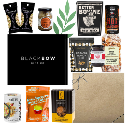 Dad’s Snack Stash Father’s Day gourmet gift box with jerky, pistachios, caramel snacks, smoky seasonings, cookies, dip mix, and dad-themed treats in a sleek black gift box.