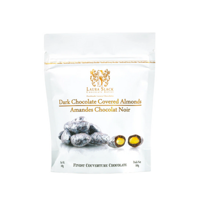 Laura Slack dark chocolate covered almonds in a white 100g resealable pouch with gold lettering and a product image of chocolate-coated almonds.