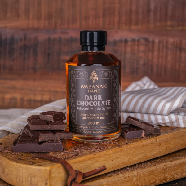 200 mL bottle of dark chocolate maple syrup, a rich and sweet gourmet treat for Canadian gift boxes.