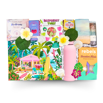 Summer-themed gift box featuring a tropical puzzle, sangria candle, reusable water bottle, vacation-inspired activities, sweet treats, self-care essentials, and beach-inspired accessories by Black Bow Gift Co.