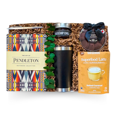 Everyday Essentials Box with tumbler, notebook, savoury bacon jam, crackers, and cozy drink elements