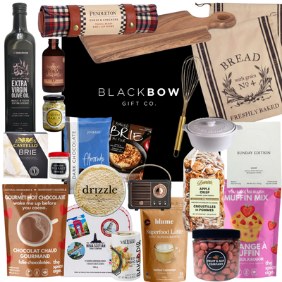 Large family gift box with gourmet treats, games, and home-focused accents.