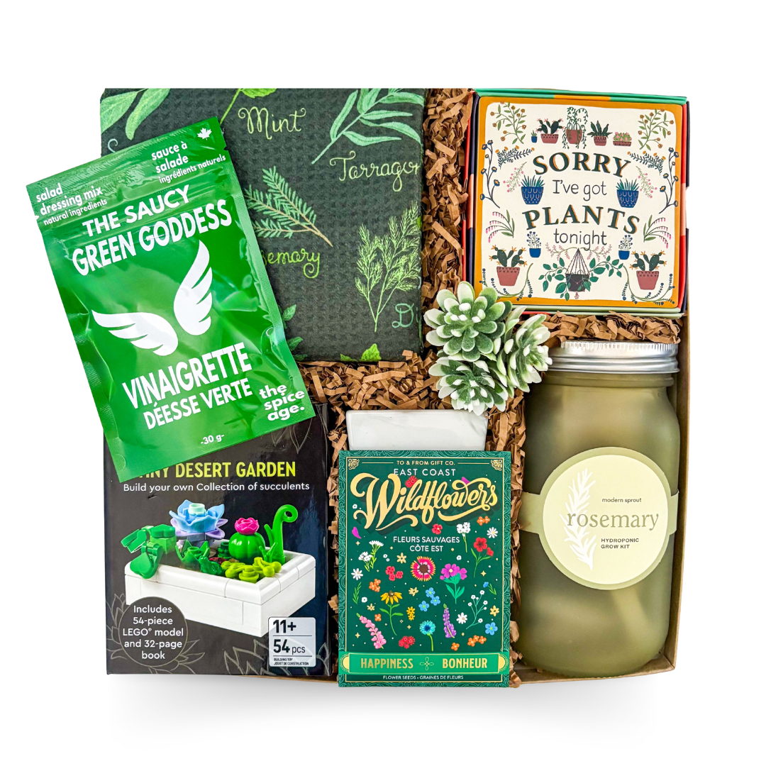 Gardening-themed luxury gift box featuring wildflower seeds, a grow kit, plant-themed keepsakes, herb-inspired accessories, and nature-inspired gifts by Black Bow Gift Co.

