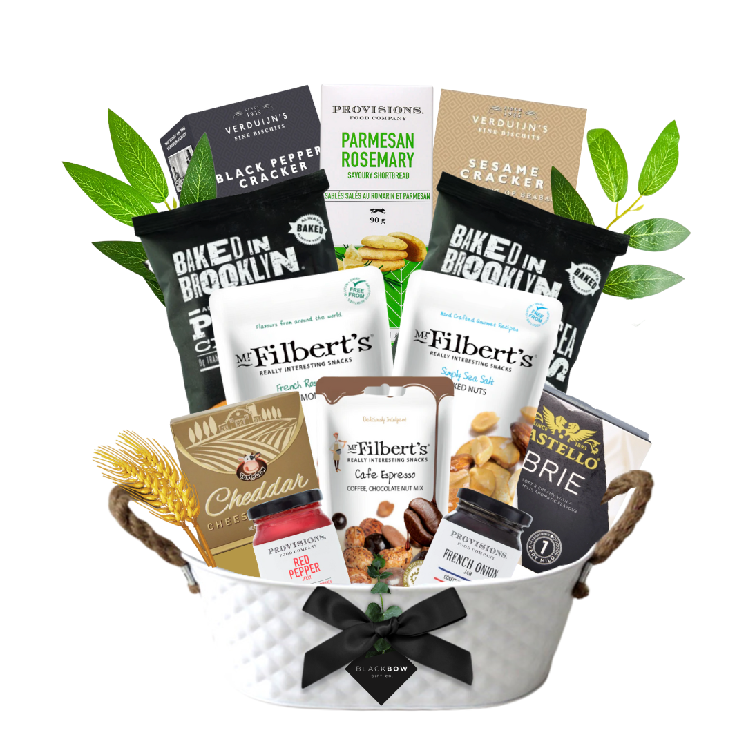 Savoury gourmet gift basket with premium snacks, crackers, spreads, and charcuterie accents for corporate and personal gifting.