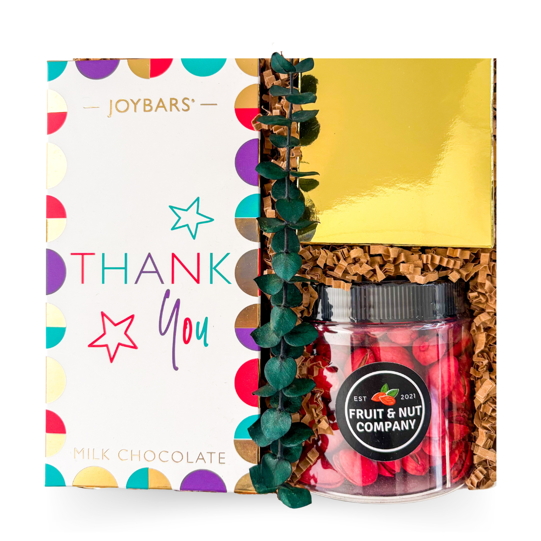 Small luxury thank you gift box with Belgian milk chocolate bar, metallic gold treat box, gummies, and red pistachios for corporate and client appreciation