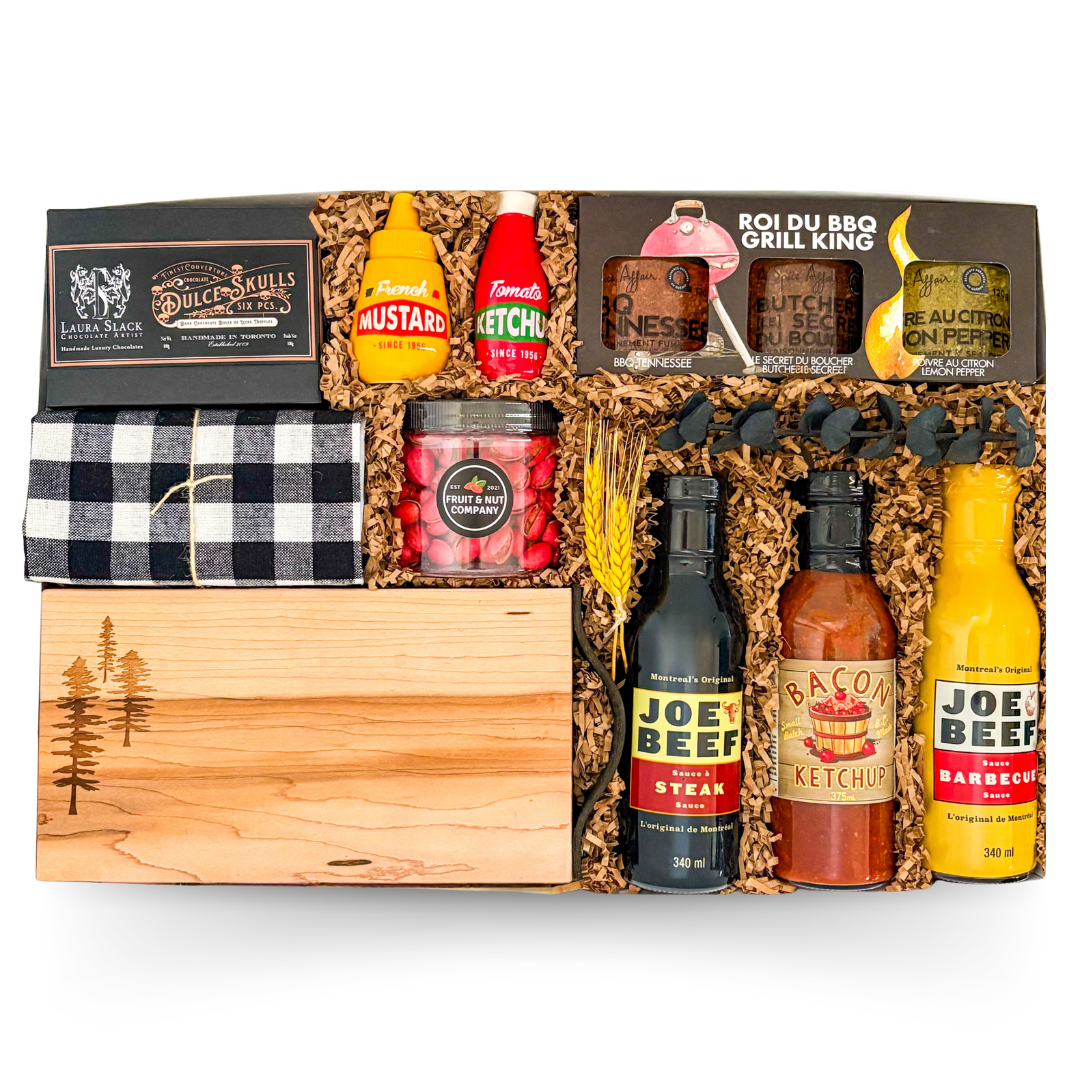 Grill Master BBQ gift box featuring gourmet grilling favourites, premium condiments, savory snacks, entertaining essentials, and a keepsake serving board. A thoughtful gift for grill enthusiasts, hosts, Father's Day, retirements, and celebrations.