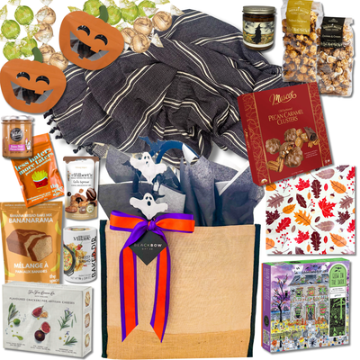 Halloween at Home gift basket with cozy throw, haunted house puzzle, baking mix, candle and sweet and savoury treats
