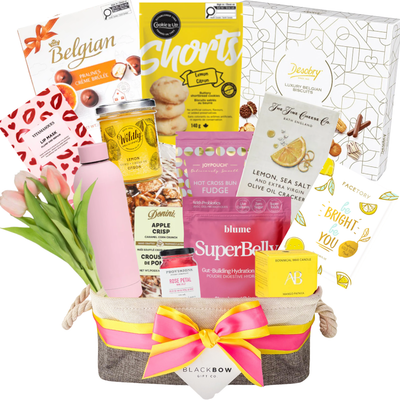 Hello Sunshine gift basket with treats, self care items and cheerful accents by Black Bow Gift Co.