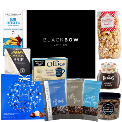 Holiday Office Treats mailer box with sweet and savoury snacks and office magnet kit.