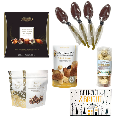 Holiday Snack Basket featuring assorted sweet and savoury treats in a festive Merry & Bright container with decorative Christmas accents.