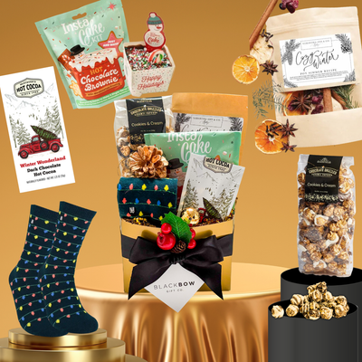 Cozy holiday gift box with festive touches and winter treats by Black Bow Gift Co.