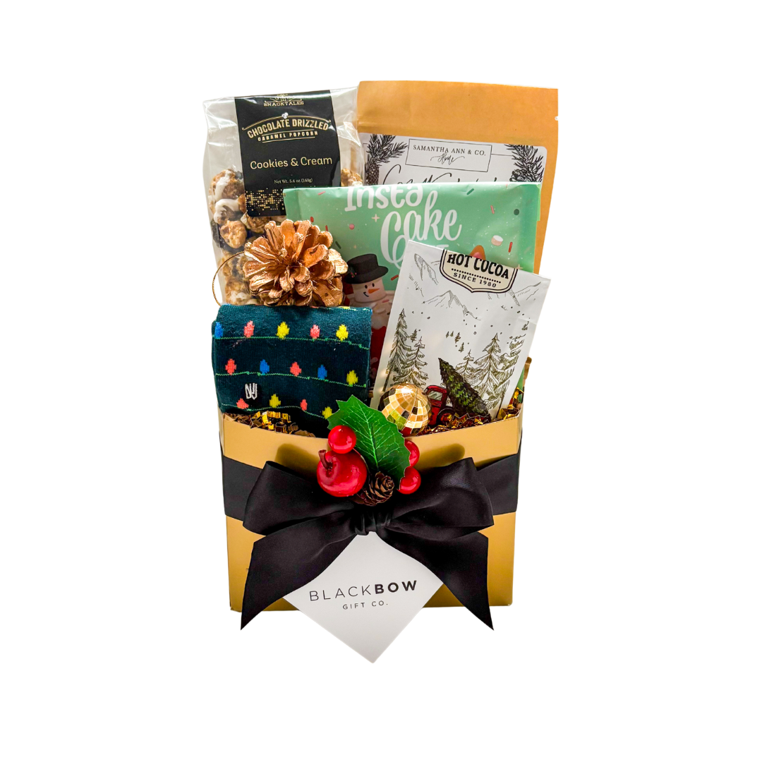 Cozy holiday gift box with festive touches and winter treats by Black Bow Gift Co.

