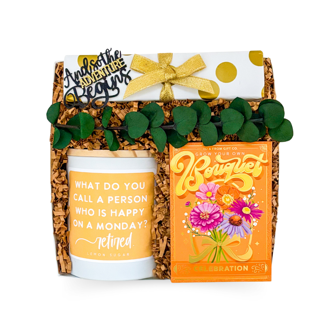 Legacy in Bloom retirement gift box in white and gold with elegant celebratory accents.