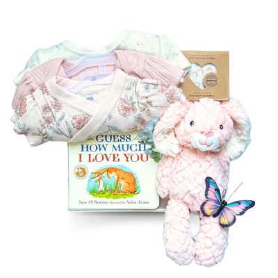 Little Love Story baby girl gift box with pink plush bunny, floral baby clothing, baby socks and Guess How Much I Love You book.