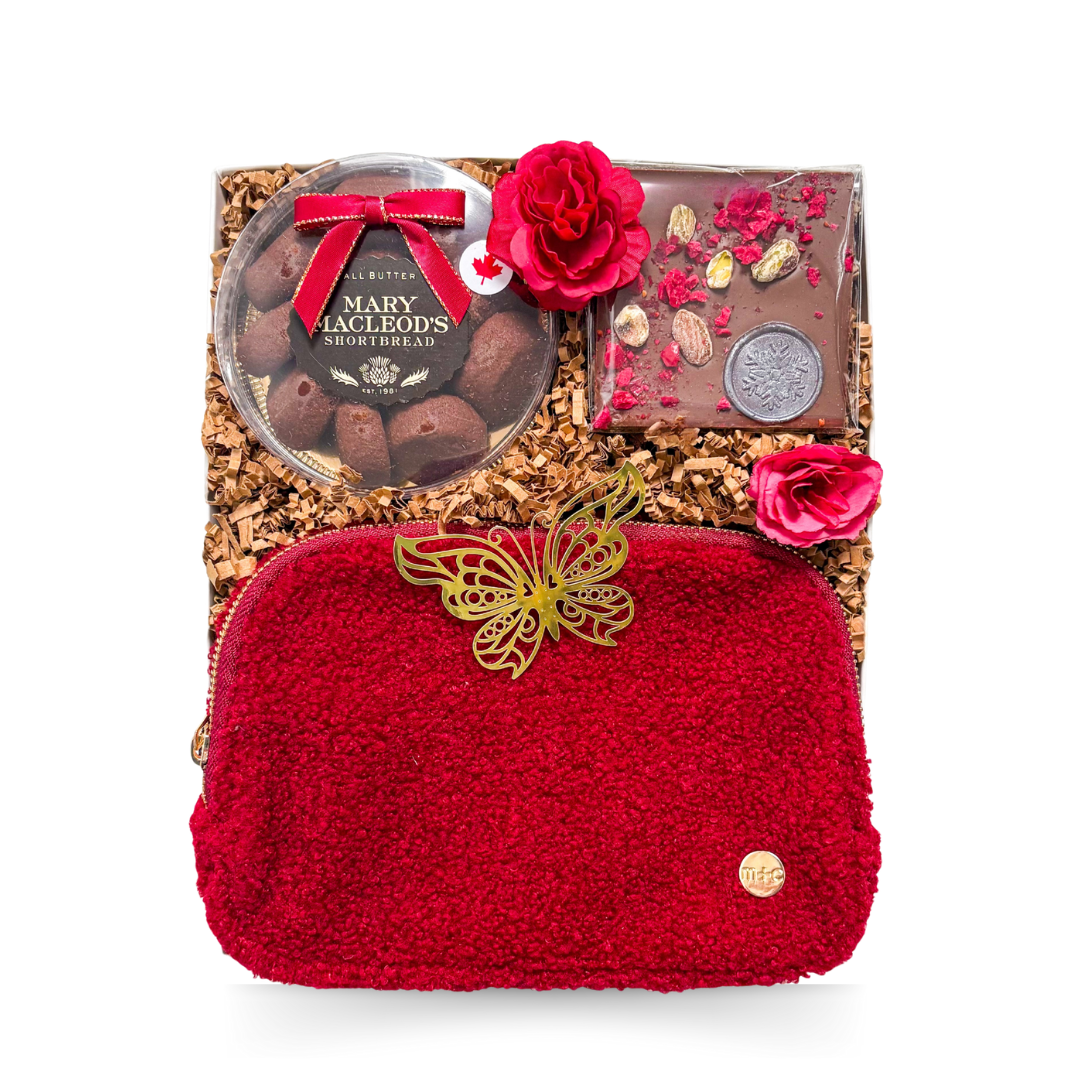 Little Luxury for Her burgundy gift box with sherpa crossbody bag, gourmet treats and elegant feminine accents by Black Bow Gift Co.