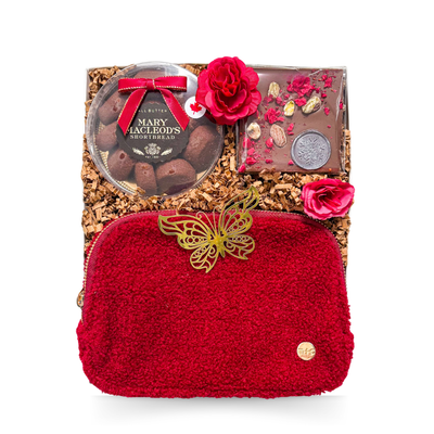 Little Luxury for Her burgundy gift box with sherpa crossbody bag, gourmet treats and elegant feminine accents by Black Bow Gift Co.