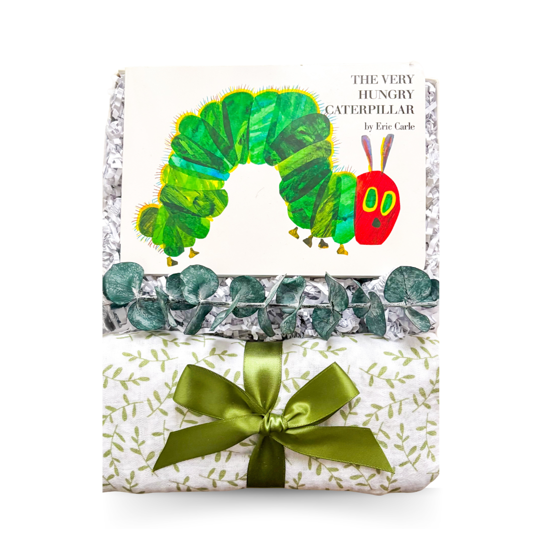 Little Moments baby gift box with muslin baby blanket and classic storybook in a signature gift box by Black Bow Gift Co.
