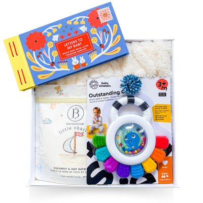 Gender-neutral baby gift styled for happy, everyday moments with a growing baby.