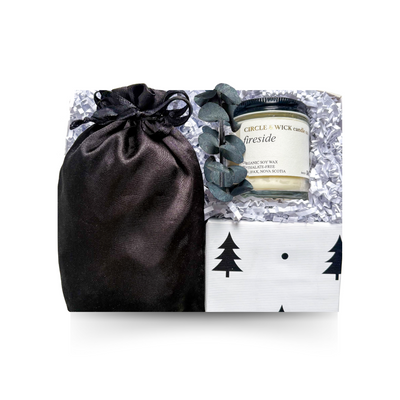 Made in Nova Scotia gift box featuring locally made Fireside candle, Nova Scotia shortbread, holiday tea and keepsake ornament.