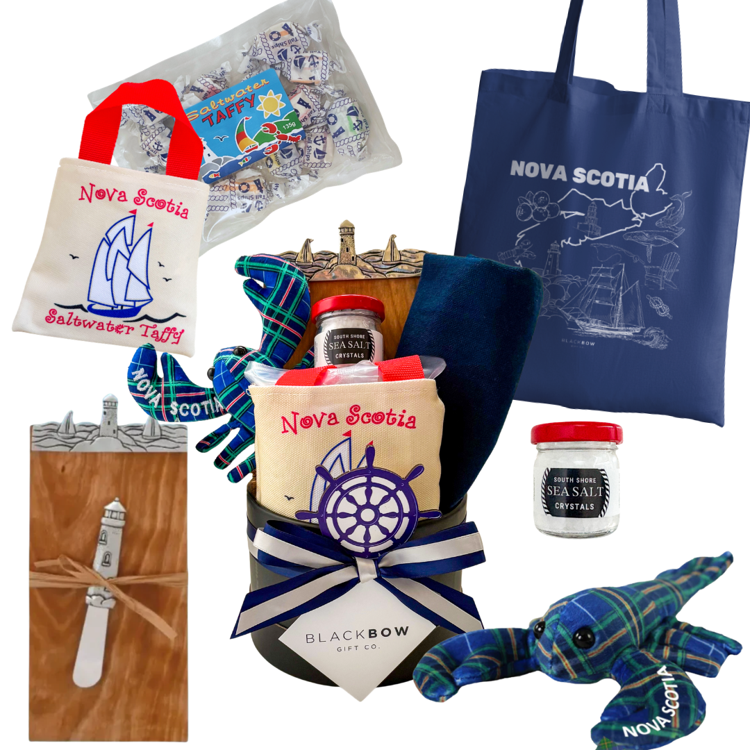 Maritime Moments Nova Scotia gift featuring local keepsakes, sea salt, lobster plush, blanket and East Coast treats.

