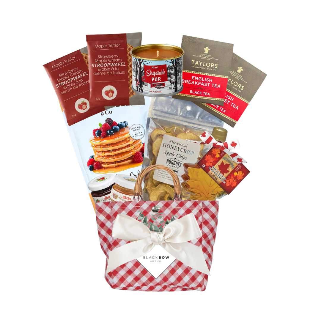 Morning Favourites breakfast gift basket featuring gourmet pancake mix, maple treats, tea and breakfast favourites in a reusable red gingham basket.