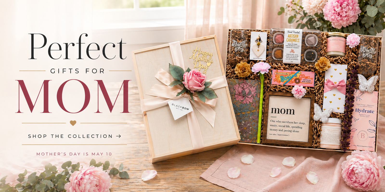 Gifts for mom with flowers and cards on a wooden surface